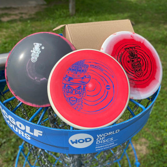 DiscGolf Starter Set - WOD Pro Paket mit Pixel Putter, Mako3 Midrange und Savant Fairway Driver
WOD exklusives Design mit Hutman
